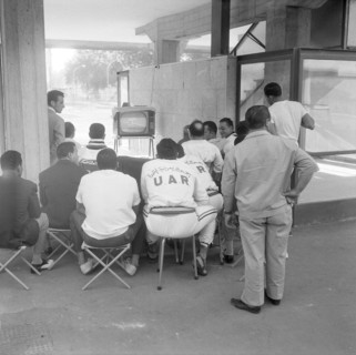 Rome 1960: athletes watching opening ceremony on TV.