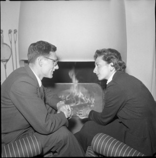 Marc Wirz and Jeannette Altwegg in love in front of fireplace, Berne 1954.