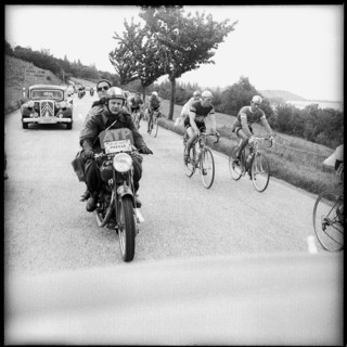 ATP photographer and motorcyclist at the Tour de Suisse ca. 1955.