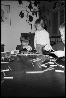 Children playing with a model railway, 1967.