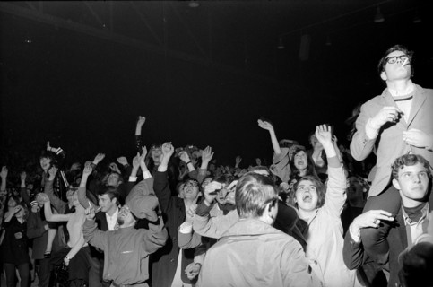 Cheering fans at Rolling Stones concert at Hallenstadion, Zurich 1967 .