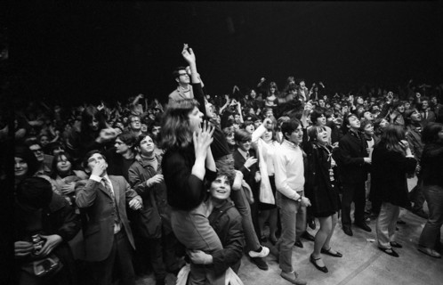 Cheering fans at Rolling Stones concert at Hallenstadion, Zurich 1967 .