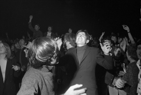 Cheering fans at Rolling Stones concert at Hallenstadion, Zurich 1967 .