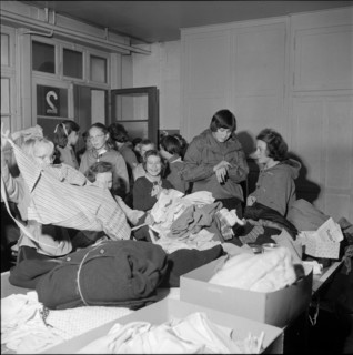 Basel girl scouts sorting clothing for Hungary 1956