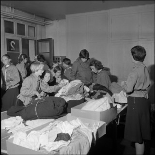 Basel girl scouts sorting clothing for Hungary 1956
