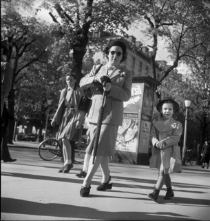 People passing by in Zurich, 1950