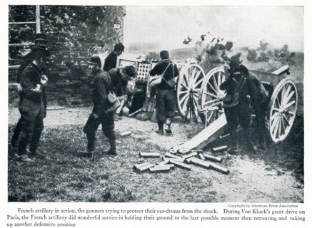 This photo taken in early World War I has the caption: French artillery in action, the gunners