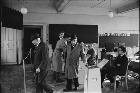 Men in polling station in Zurich, 1966.