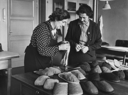 Women with warm backless slippers for Swiss soldiers 1939.