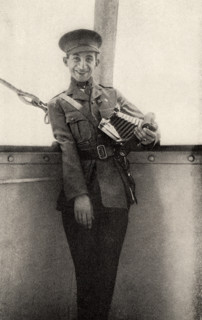 This photo shows Private Peat who fought in World War I. The caption reads: Still smiling though