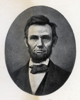 The caption for this image reads: 'Lincoln in 1865. from a photograph by Moses Parker Rice.'