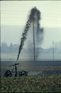 Sludge sprayer on a meadow, 1980.
