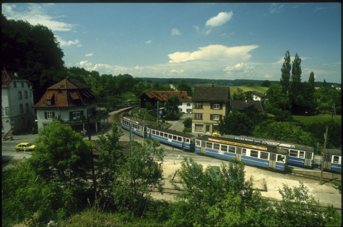 Train BLT at stop, station, 1981.