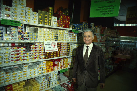 Karl Schweri in front of tobacco shelfs, 1984.
