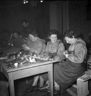 Women's reserve unit, women repairing electrical appliances; 1942.
