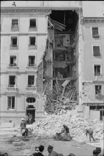 Fire brigade in action at apartment house after explosion, Geneva 1965.