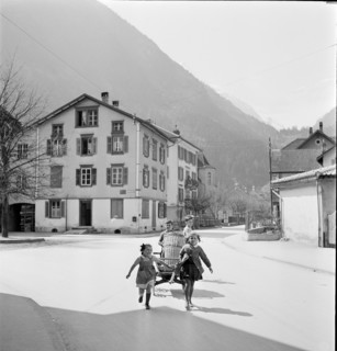 Girls carrying wooden handcart in Erstfeld; 1942