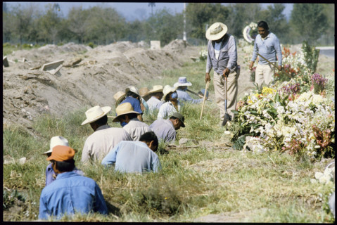 Digging graves after earthquake Mexico City 1985