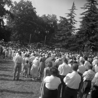 Audience listening to Baptist preacher Billy Graham in Geneva, 1955