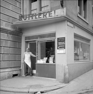 Butcher in front of a tripe shop in Zurich, 1956