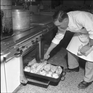 Grande Dixence, construction site cook at the oven 1957