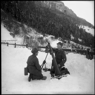 Avalanche in Vals, boys carrying parcels with solidarity donations. 1951