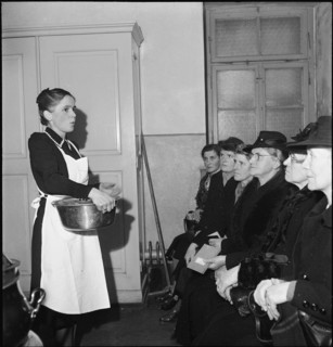 Power outage, women in emergency kitchen; 1943