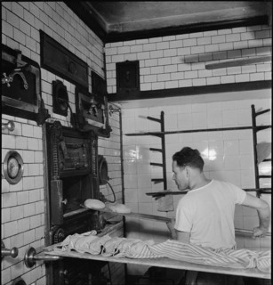 Baker in the bakery, oven; 1943