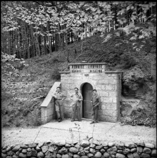 Workers in front of the Henniez Lithinée mineral spring; 1958