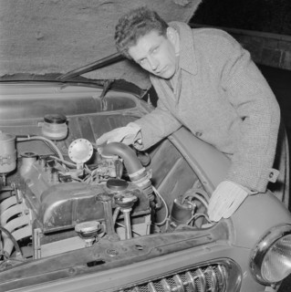 Inventor with gaspowered car, 1956