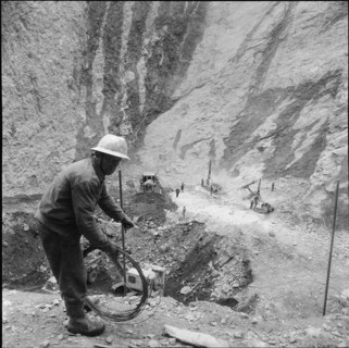 Luzzone dam: building site, blasting works 1960.