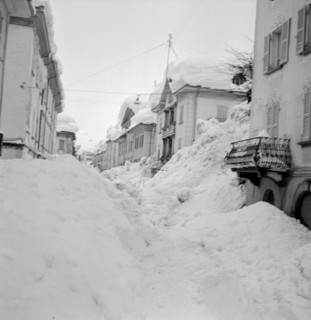 Airolo 1951, snow covered deserted  lane.