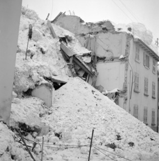 Airolo 1951, snow covered  lane, rubble.