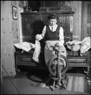 Woman spinning in weaving mill in the Münstertal, 1946.