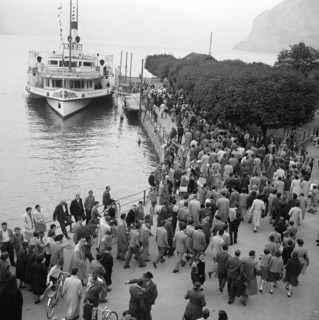 People at landing stage in Ticino, 1953.
