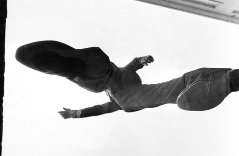 Man standing on glass, photographed from underneath, 1969.