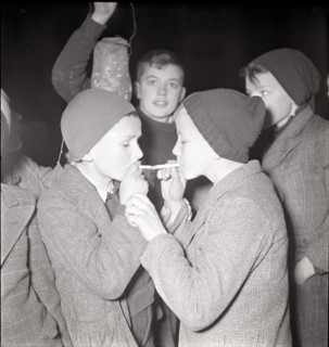 Boys smoking at the end of the school semester.