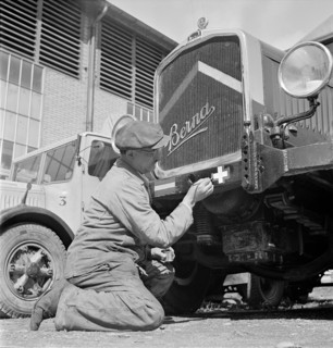 Spanish and Swiss national flag are painted on truck rear ; 1944.