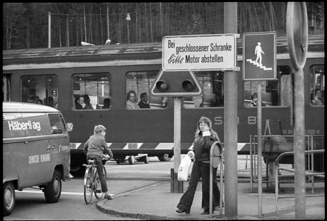 Sign for turning off the engine in front of a gate, 1972.