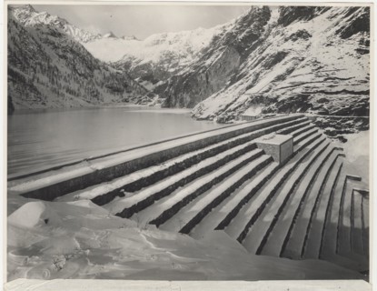 Lake Fregabolgia the building of the dam. Carona, Italy