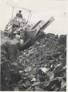 Reforestation a tractor machine preparing the field