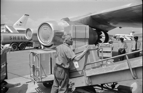 Loading an aeroplane, airport Zurich-Kloten 1966.