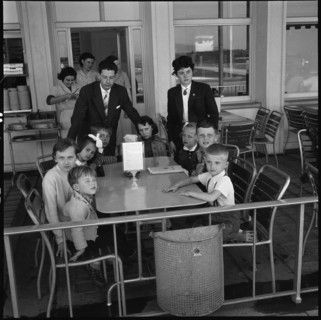 Gerold Zust with Hungarian children at airport Kloten 1957.