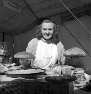 Baker with bread, 1949.