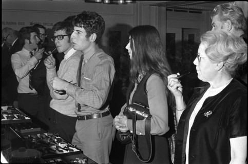 Pipe smokers in front of pipe stall 1969.