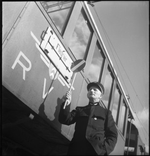 Val de Travers, station manager, train in St.-Sulpice; 1950.