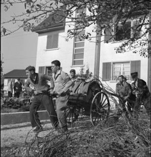 War fire brigade; men pulling hose cart; 1939.