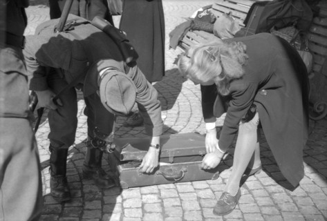 WW 2: Bombing; people fleeing, Delle 1944.