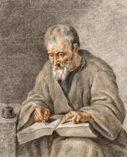 Old man writing notes in a book