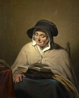 Old woman reading a Bible or a book